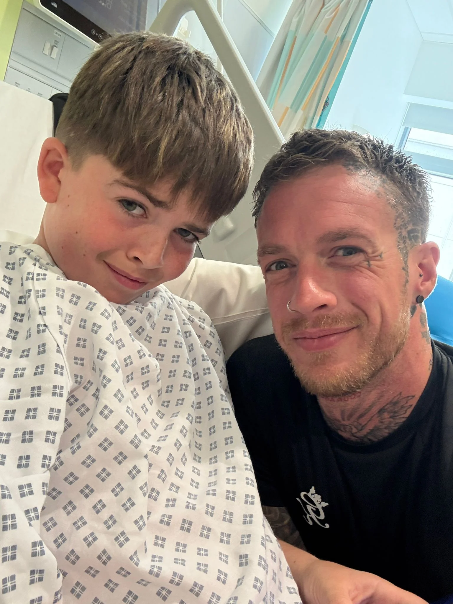 Kid in hospital with his father